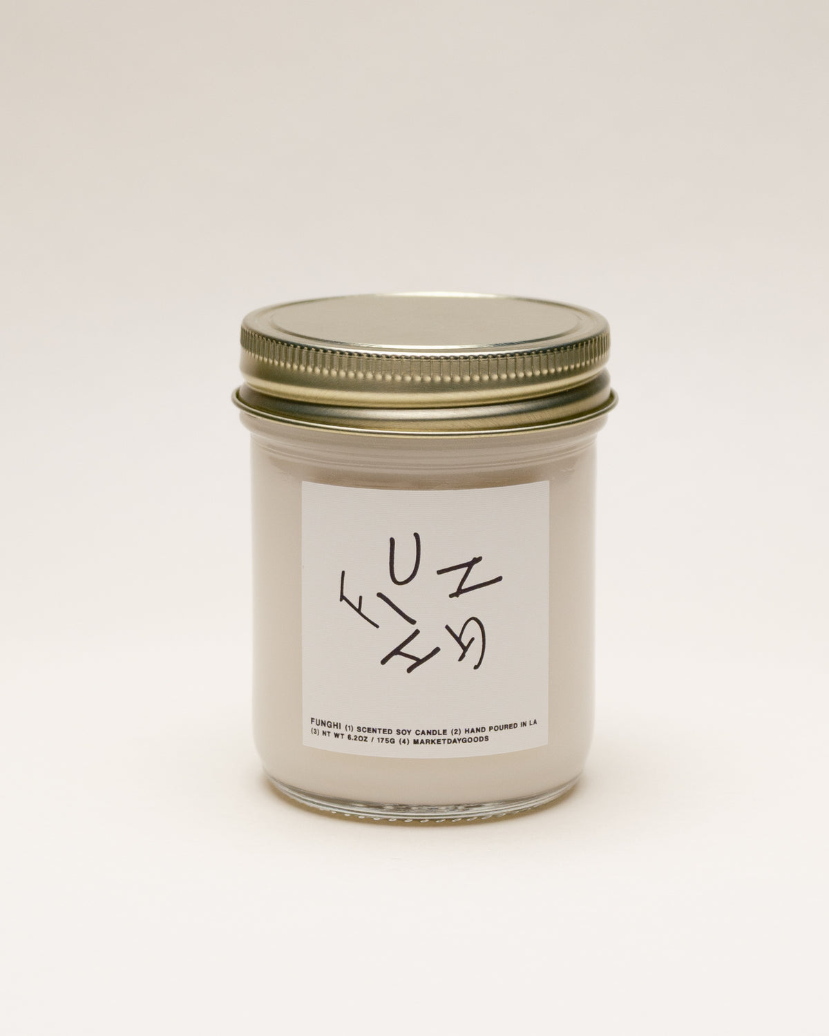 funghi soy candle with notes of moss, damp soil and eucalyptus