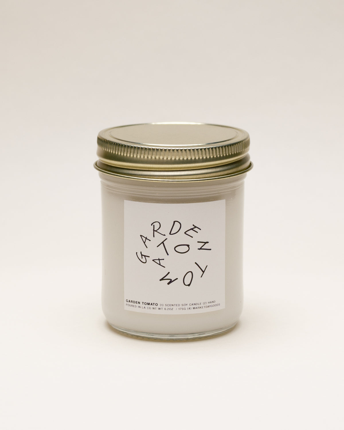 garden tomato soy candle with notes of tomato leaf, basil and lemon peel